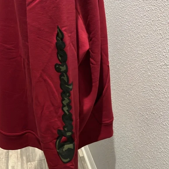 Mens Cozy up with this champion hoodie, cranberry in color with camo writing - Picture 8 of 12